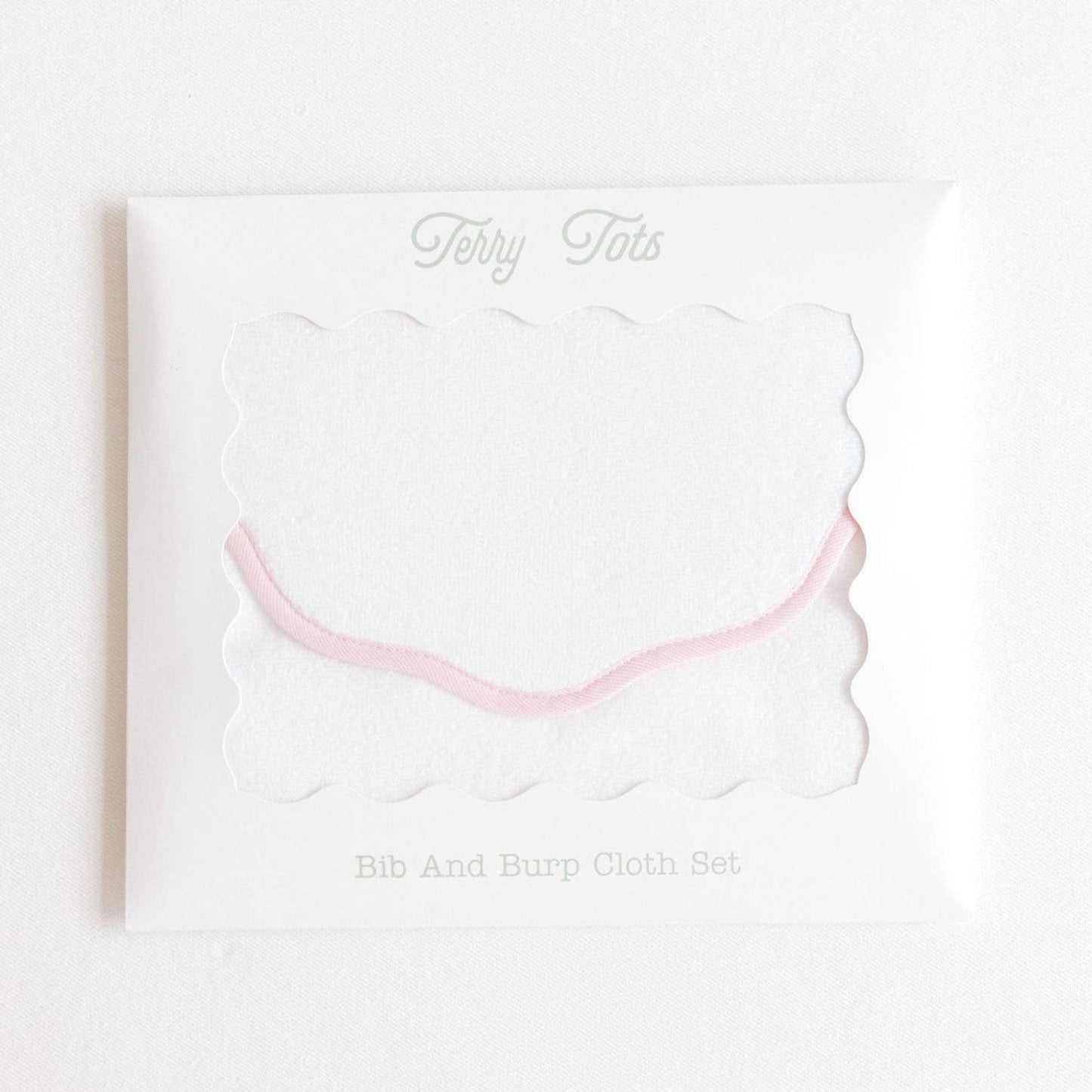 White card with pink bow on a white background