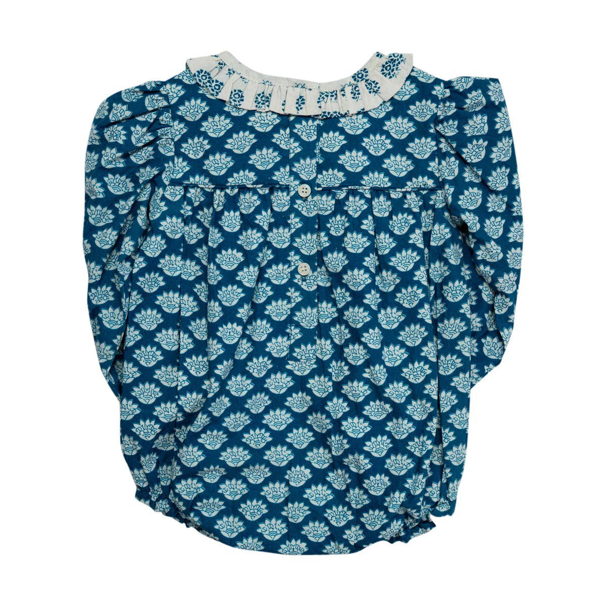 Blue floral patterned blouse with white collar on a white background