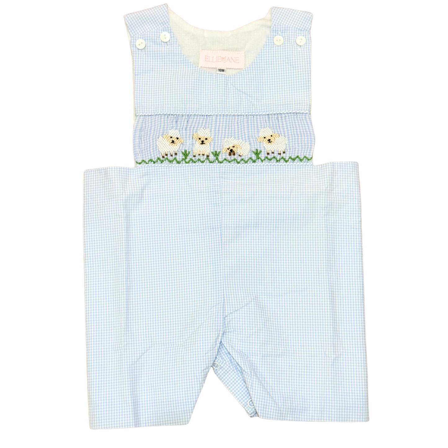 Light blue checkered romper with embroidered dogs on a white background