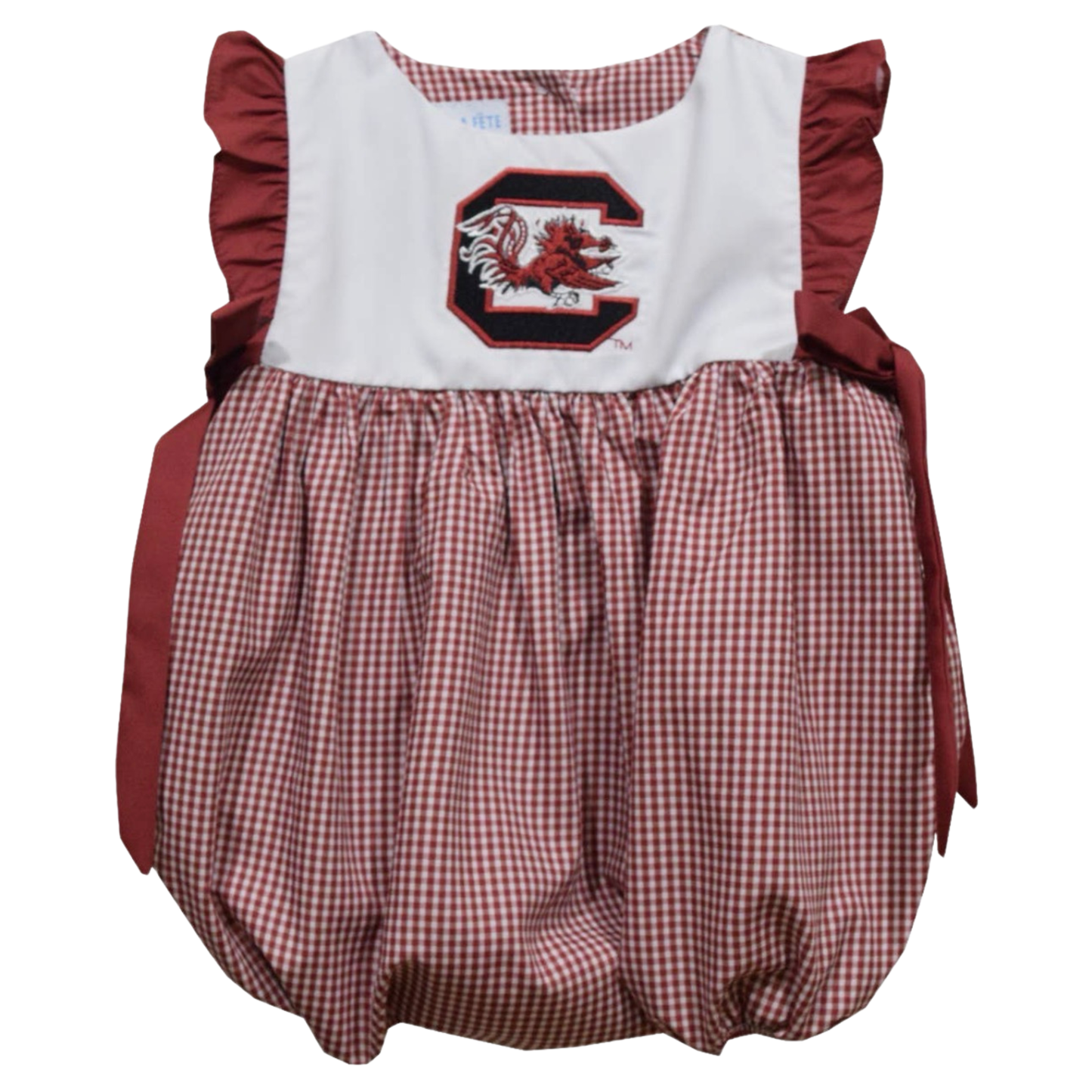A baby girl's sleeveless romper dress featuring a white bib-style top with a South Carolina Gamecocks logo, ruffled sleeves, and a red and white gingham bubble skirt.