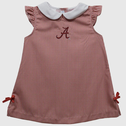 Red checkered dress with white collar and embroidered letter 'A' on a light gray background