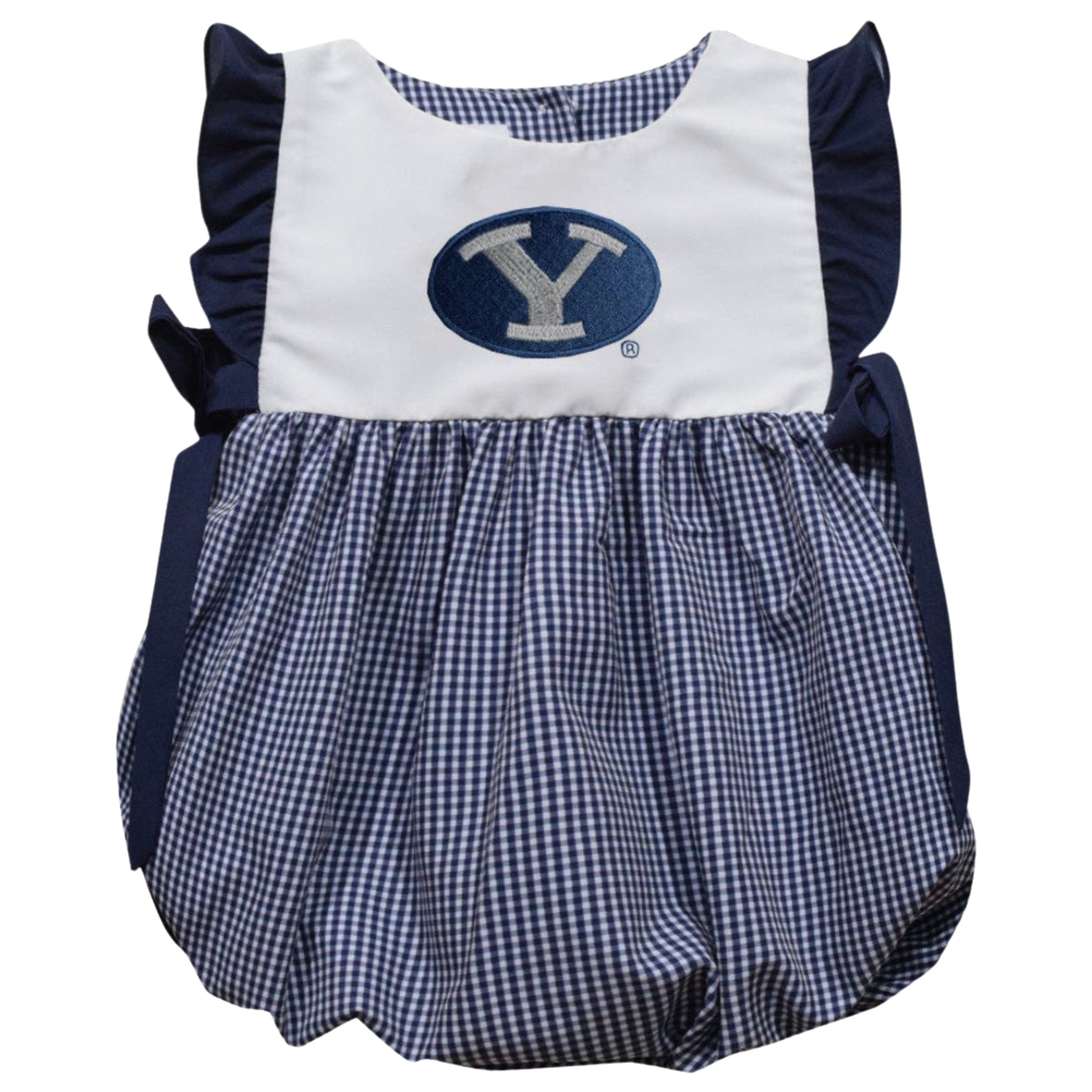 A baby girl's sleeveless bubble romper in navy blue and white. The top features a solid white bib panel with a navy blue oval logo containing a white 'Y' (representing Utah State), flanked by ruffles and navy side panels.