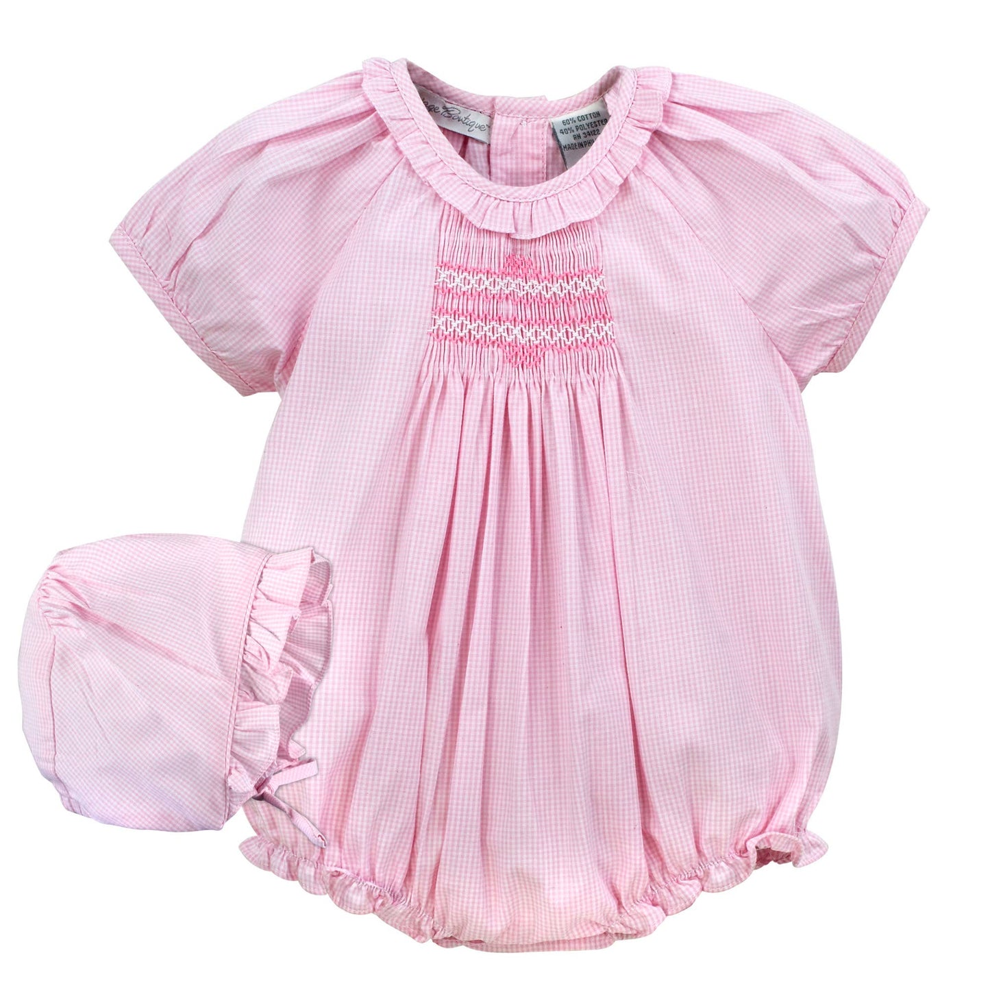 Pink baby bubble with ruffled sleeves and bottom on a white background