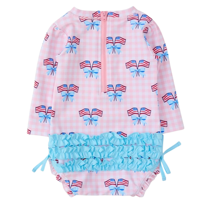 Two-piece swimsuit with American flag and bow pattern on a white background