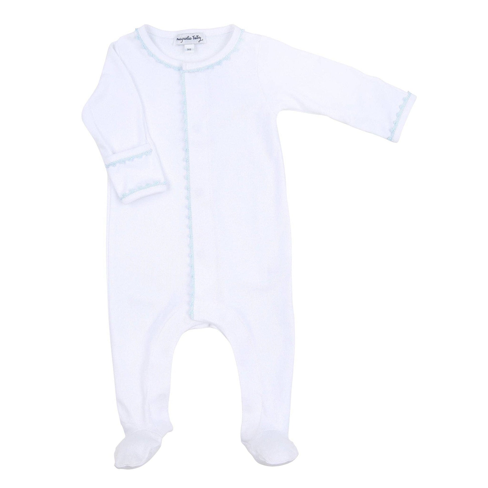 White baby onesie with footies on a white background