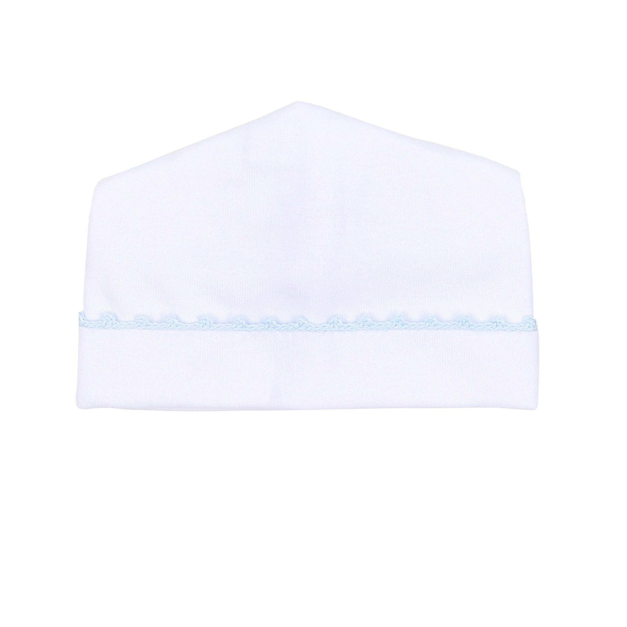 White baby hat with a light blue trim on a white background