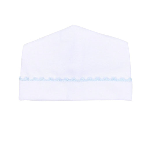 White baby hat with a light blue trim on a white background