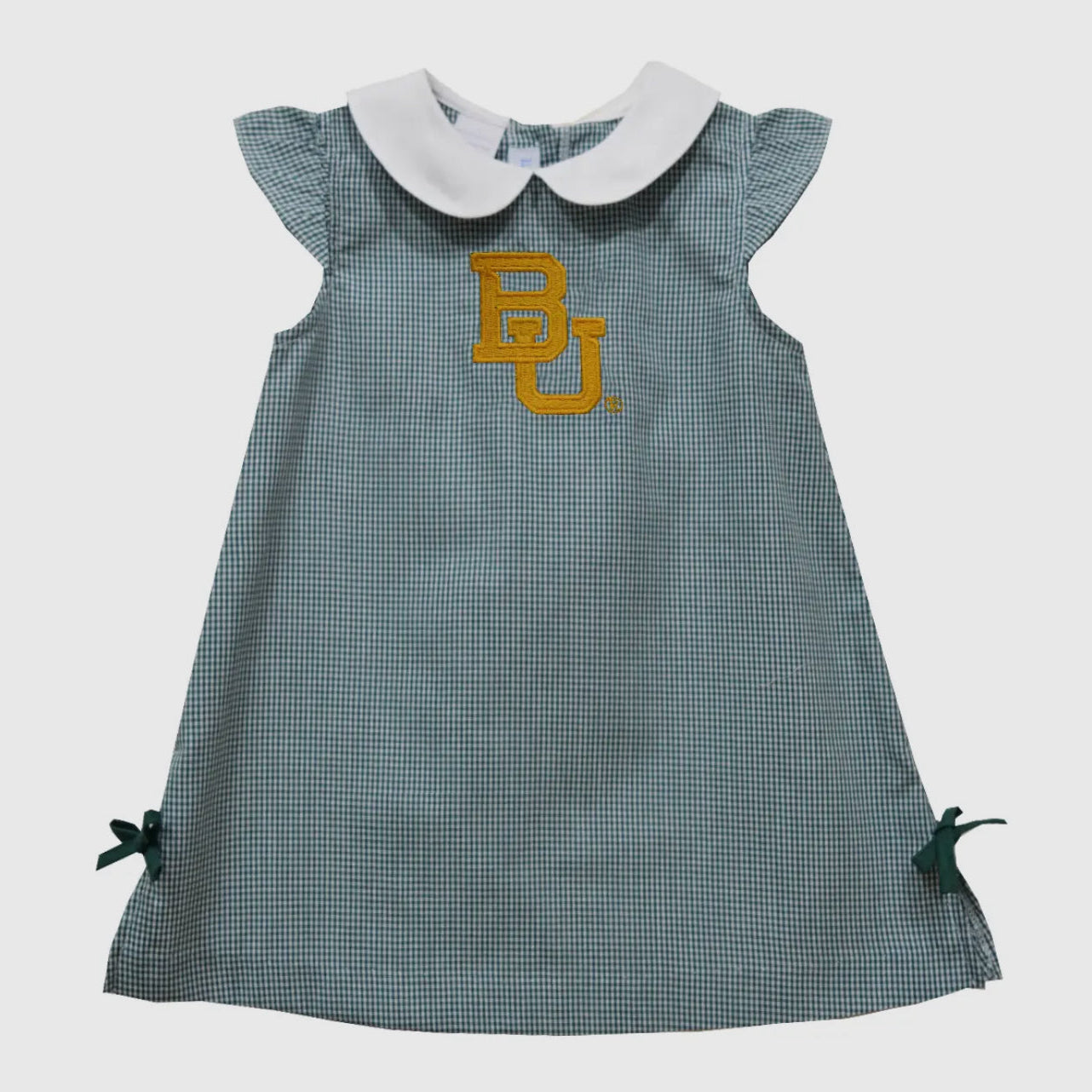 Green checkered dress with white collar and 'BU' logo on a light gray background