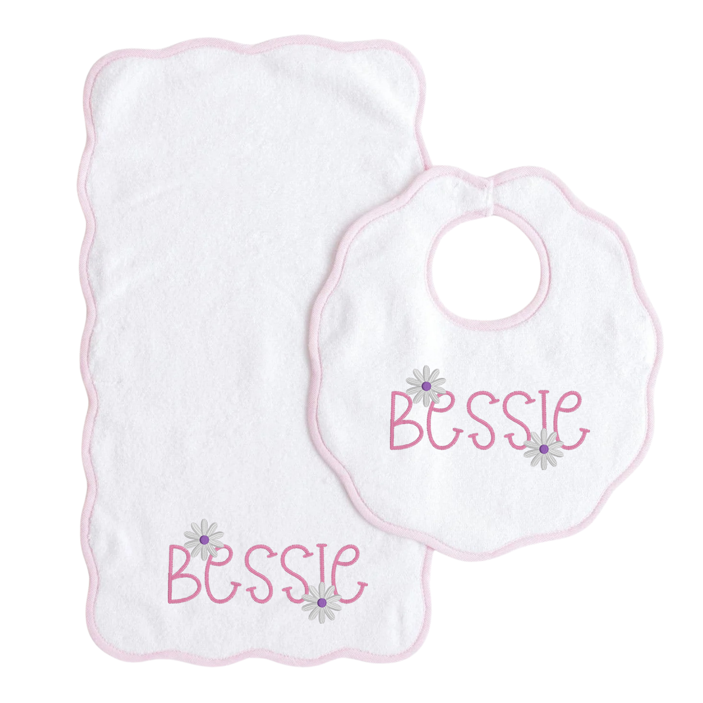 A white baby bib and matching washcloth set with pink scalloped edges, personalized with the name 'Bessie' in pink script and small daisy embroidery, shown on a white background.