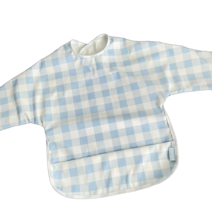 Baby bib with blue and white checkered pattern on a white background