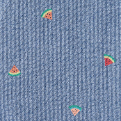 Blue fabric with small watermelon slice patterns