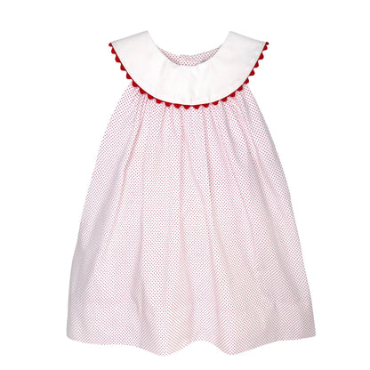 Red and white polka dot dress with a white collar on a white background