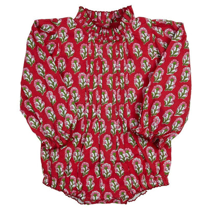 Red bubble with green floral pattern on a white background