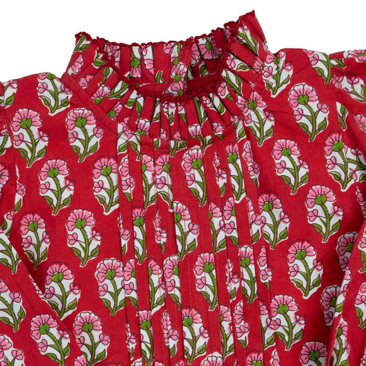 Red fabric with pink and green floral pattern