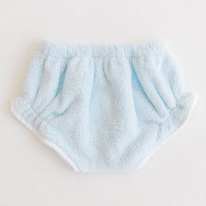 Light blue baby bloomers on a white background