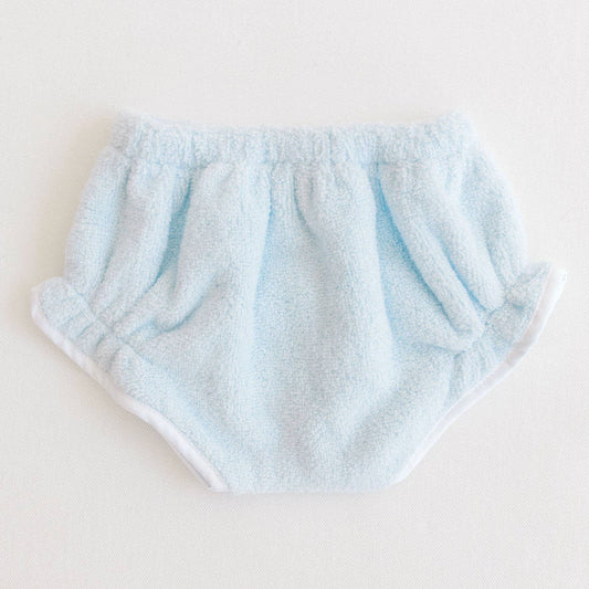 Light blue baby bloomers on a white background