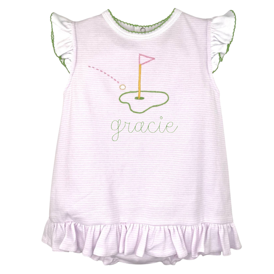White dress with ruffled sleeves and golf-themed design on a white background