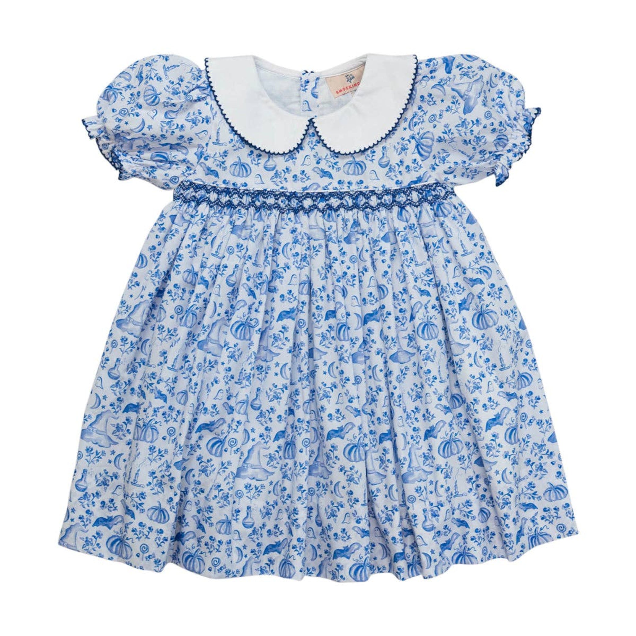 Blue floral dress with white collar on a white background