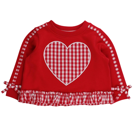 Red sweater with a white heart design and ruffled hem on a white background
