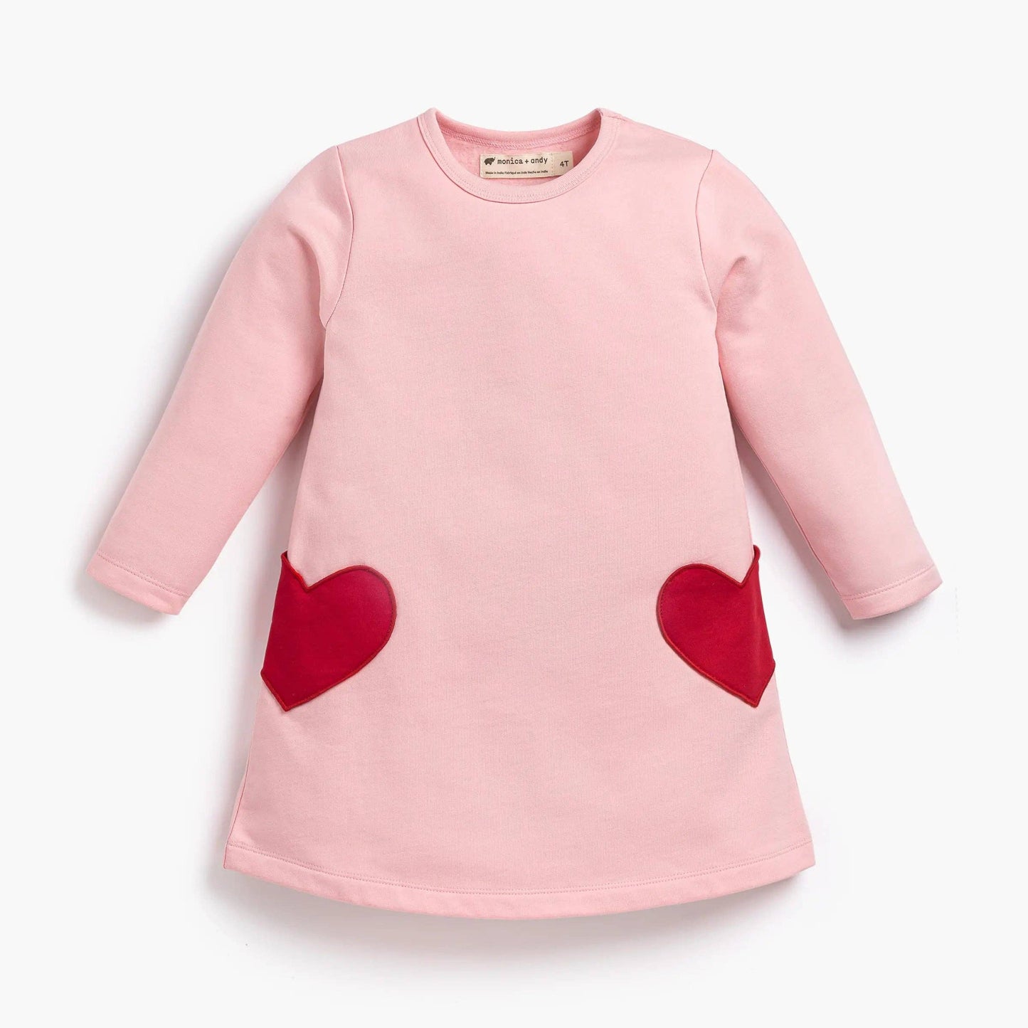 Pink dress with red heart patterns on a white background