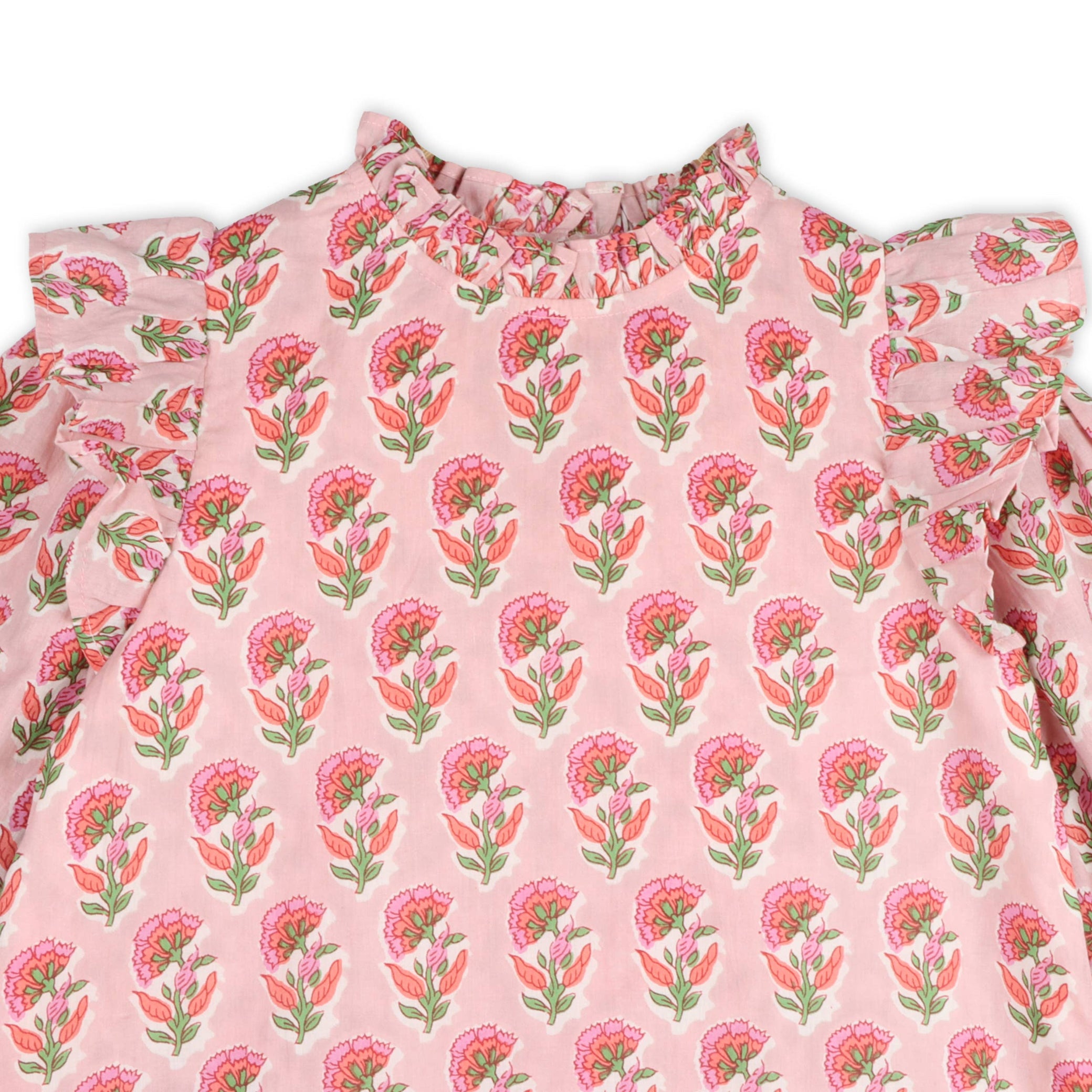 Pink patterned dress on white background 