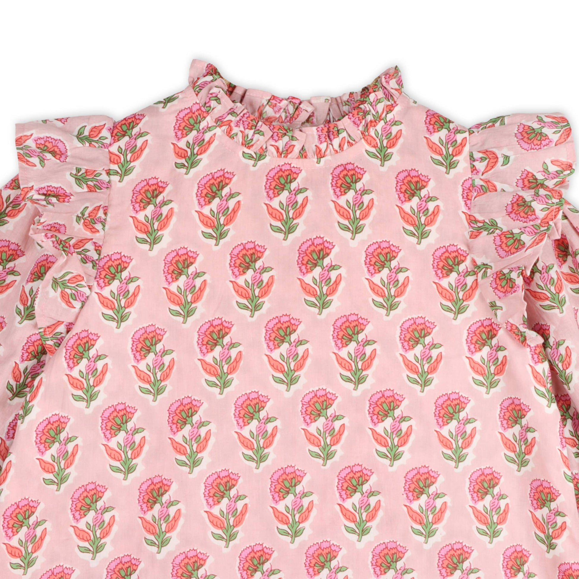 Pink patterned dress on white background 