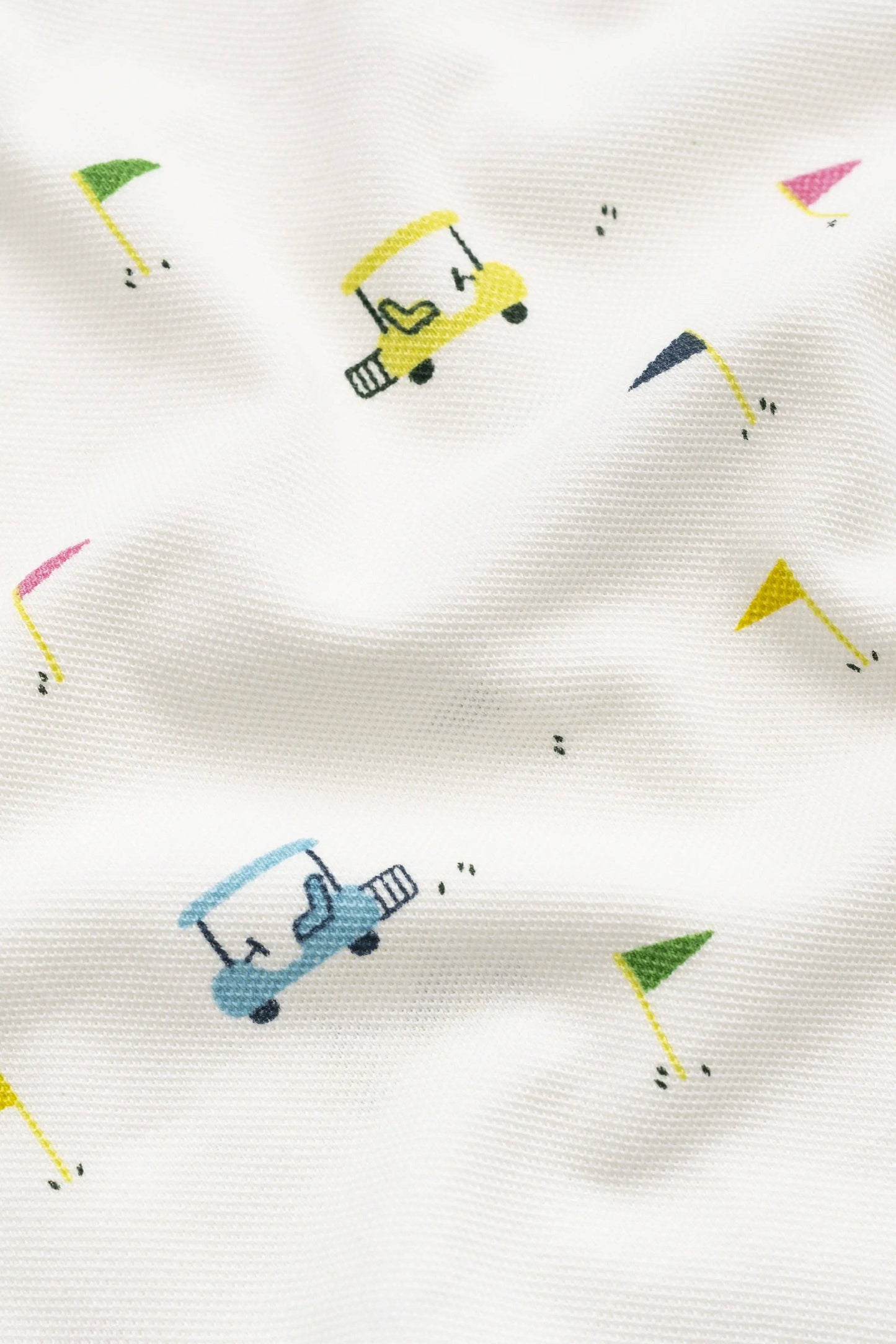 Pattern of colorful golf carts on a white fabric background