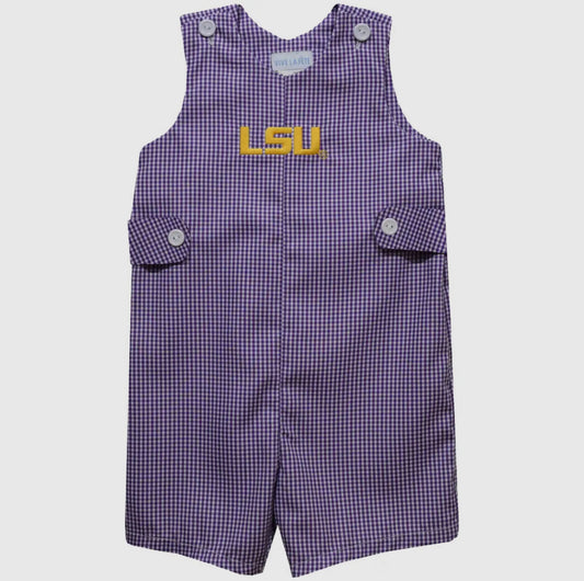 Purple checkered romper with a yellow label on a white background