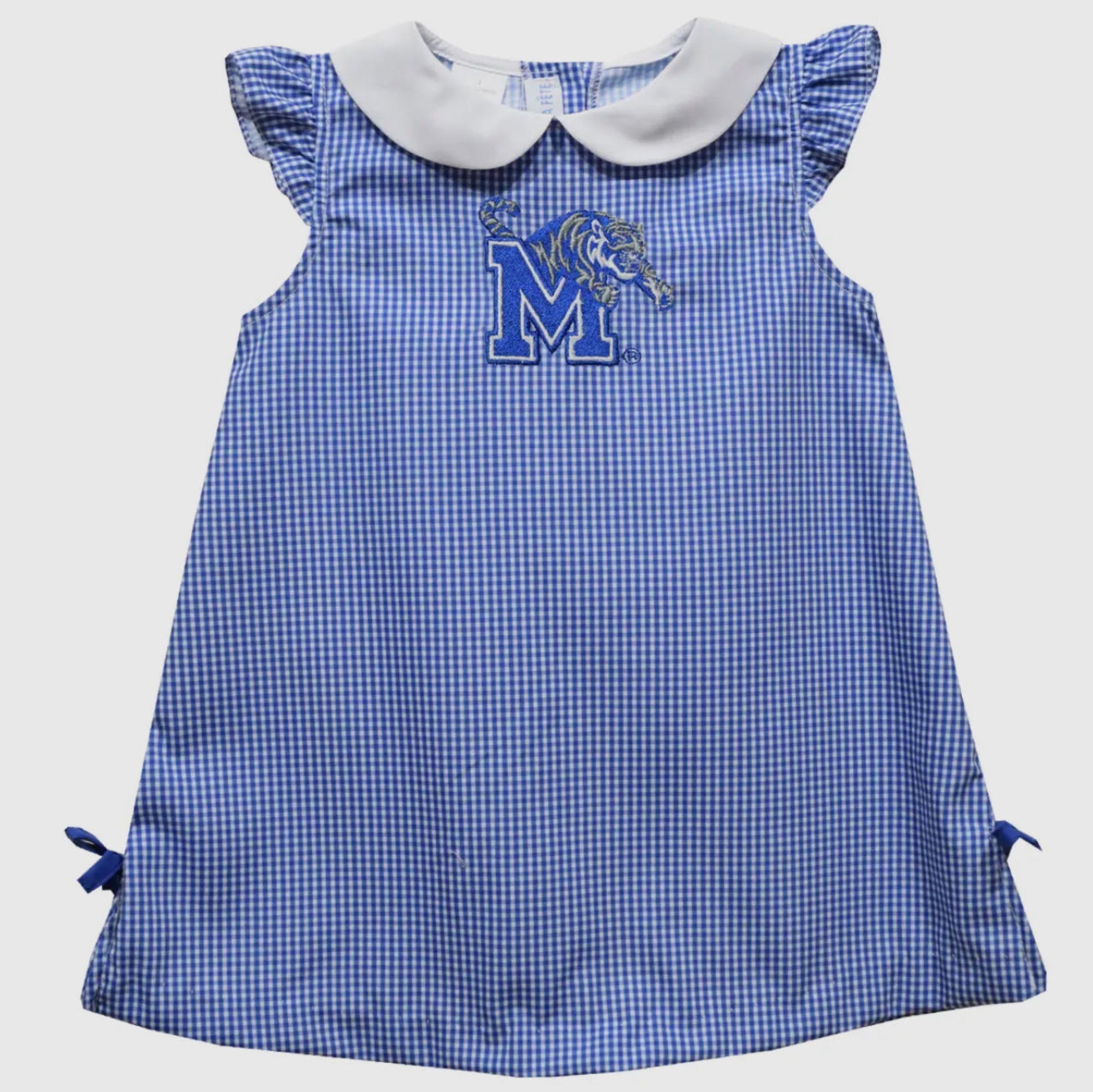 Blue checkered dress with white collar and logo on a light gray background