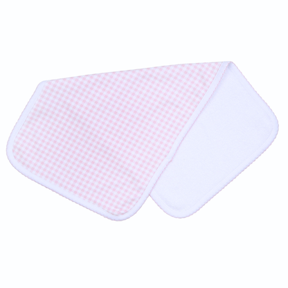 Baby bib with pink checkered pattern with pink picot trim pima cotton on a white background