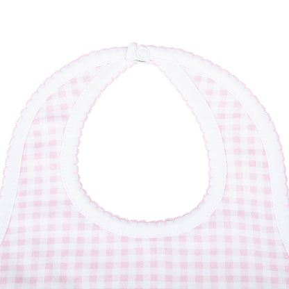 Pink and white checkered bib on a white background