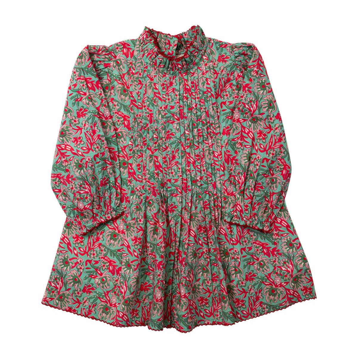 Floral patterned blouse with long sleeves on a white background
