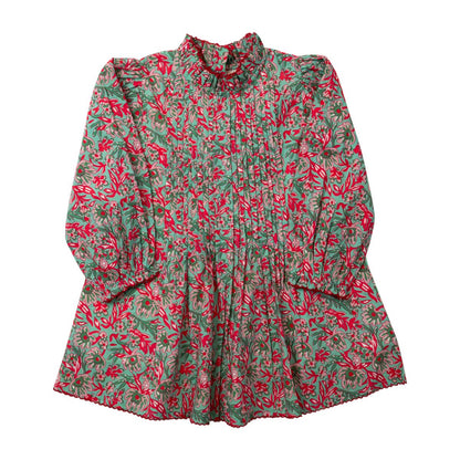 Floral patterned blouse with long sleeves on a white background
