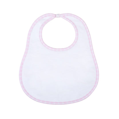 White baby bib with pink trim on a white background