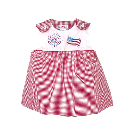 Children's dress with an embroidered American flag and fireworks design on a white background