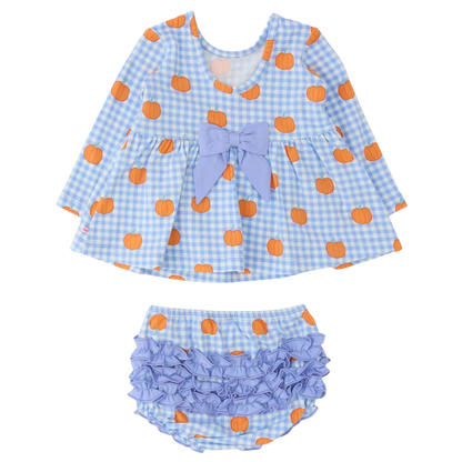 Baby girl's two-piece outfit set featuring a long-sleeve top and matching ruffled bloomers. The set has a light blue and white gingham pattern, decorated with orange pumpkin prints and a light purple bow on the chest.