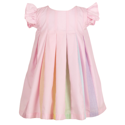 Pink dress with colorful side panels on a white background