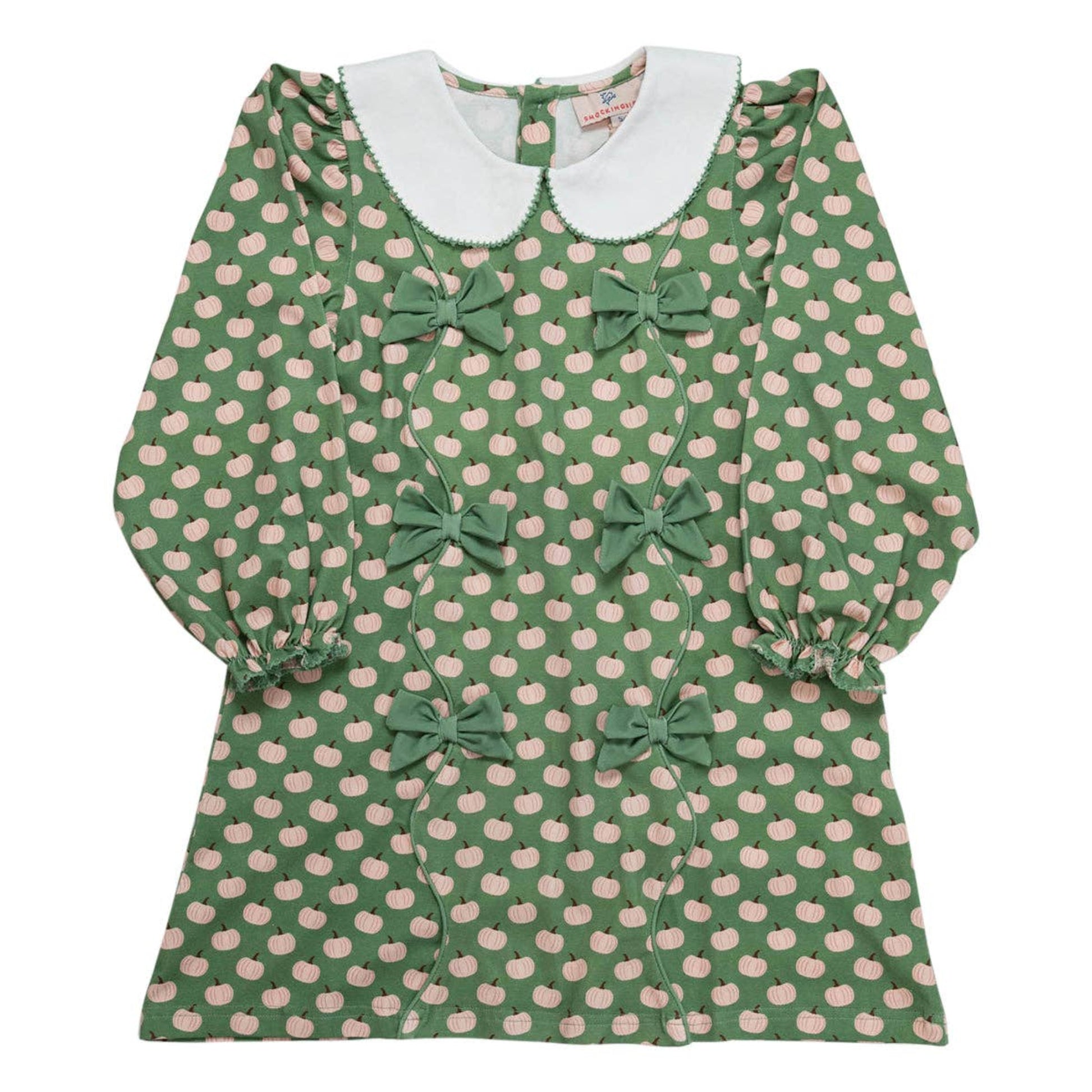 Green dress with pink pumpkin pattern and white collar on a white background