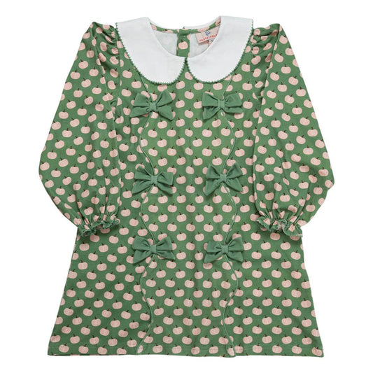 Green dress with pink pumpkin pattern and white collar on a white background