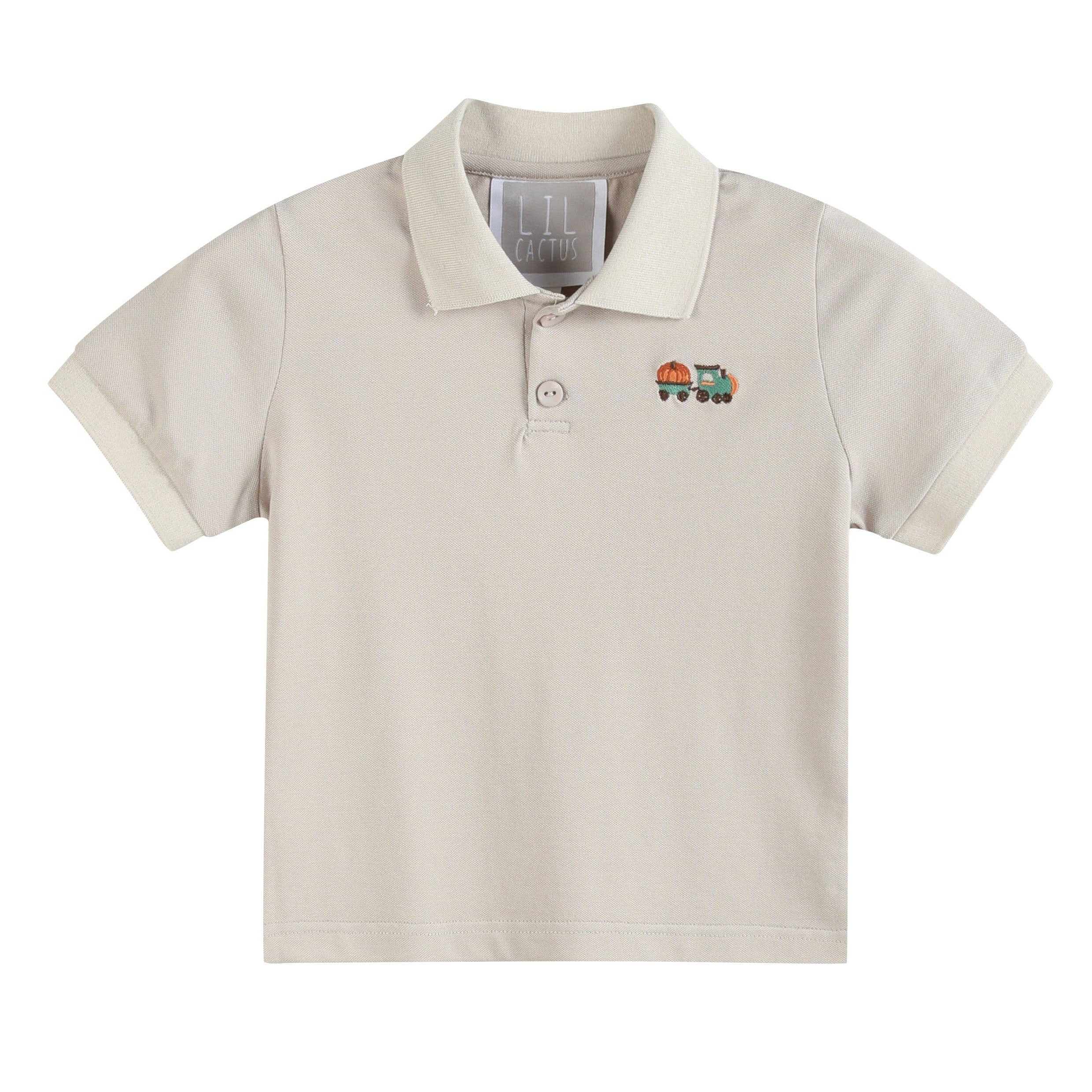 Beige polo shirt with a small embroidered design on a white background
