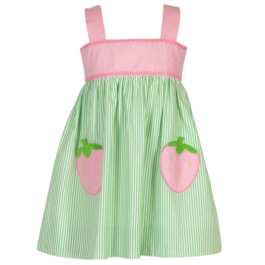 Green and pink dress with strawberry appliqués on a white background