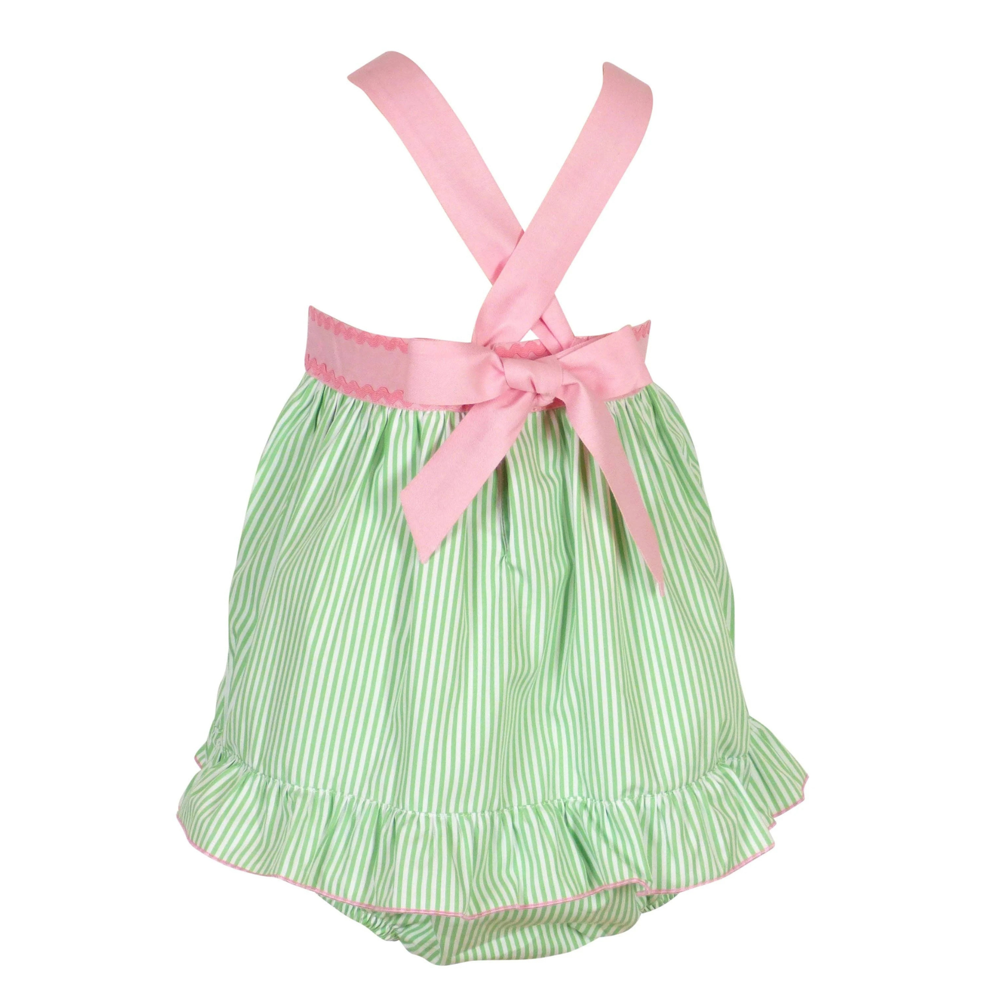 Green and white striped baby romper with pink ribbon on a white background