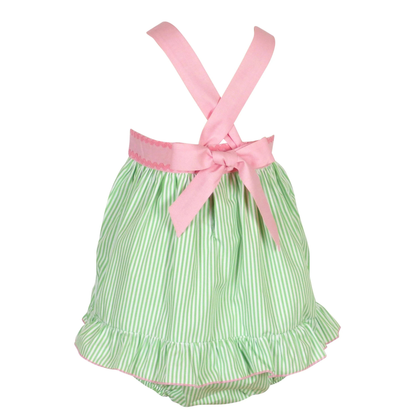 Green and white striped baby romper with pink ribbon on a white background