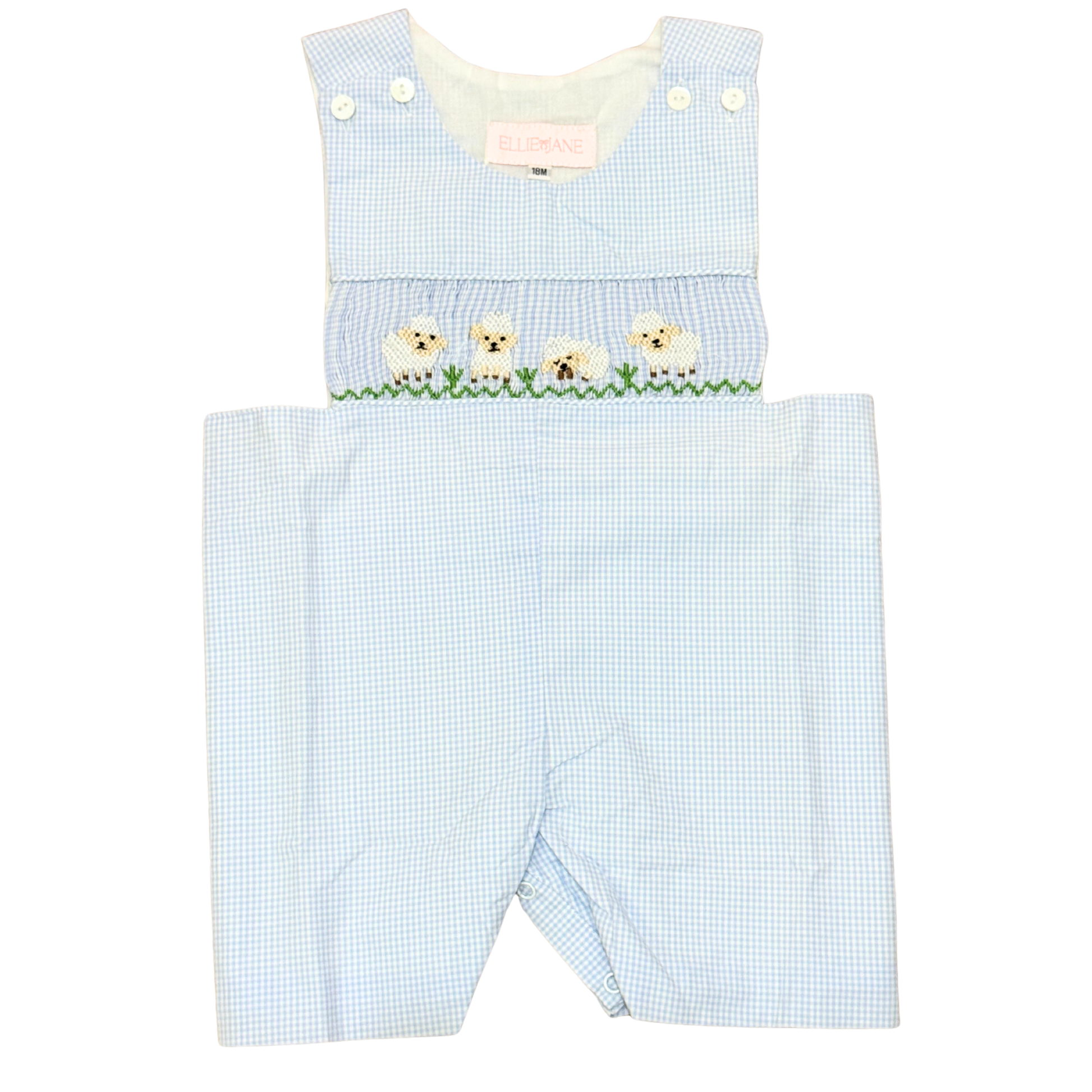 Light blue checkered romper with embroidered dogs on a white background