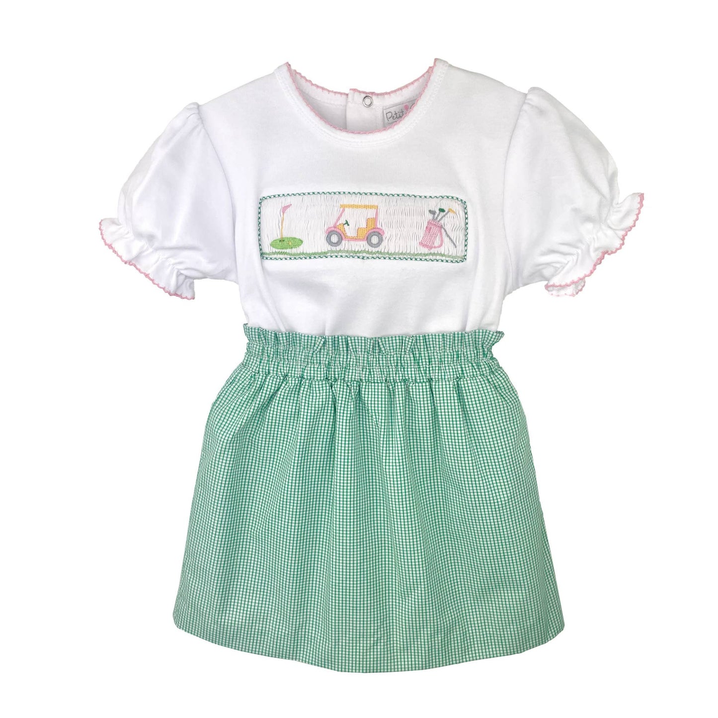White top with embroidered design and green checkered skirt on a white background