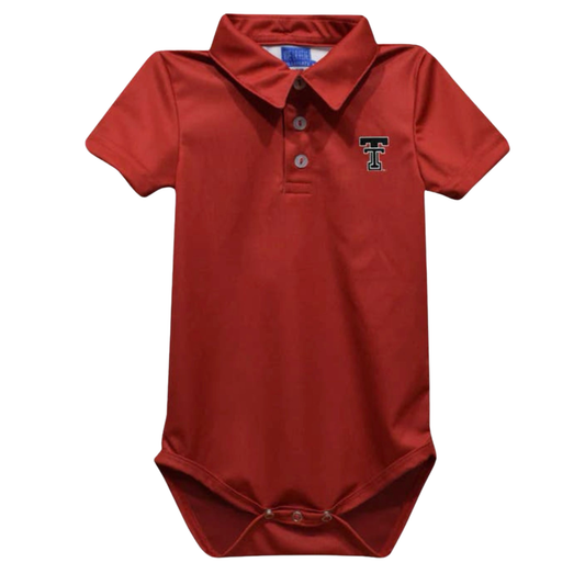 A baby short-sleeve polo bodysuit in terracotta red, featuring a three-button placket and a Texas Tech logo embroidered on the left chest, shown against a plain white background.