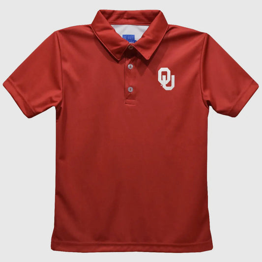 Red polo shirt with a logo on a white background